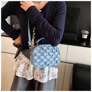 Light blue checkered crossbody bag in tweed fabric with elegant tassel details