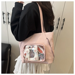 Pink ita bag tote featuring a clear display window for pins and cute plush rabbit liner