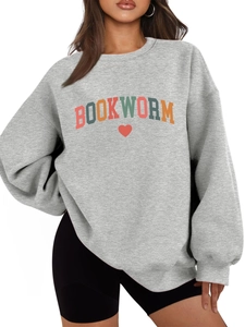 Detail of grey oversized Bookworm sweatshirt featuring vintage letter print and red heart