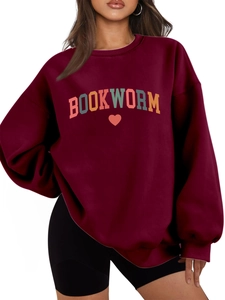 Close-up of burgundy Bookworm sweatshirt showing thick fleece fabric and ribbing