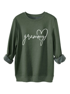 Detail of dark green sweatshirt featuring white grammy text and a heart print design
