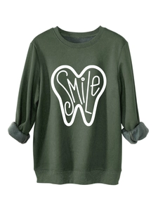 Detail view of the thick fleece lining on the sleeve cuff of this green smile sweatshirt