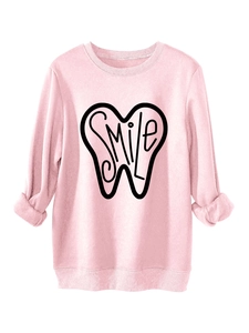 Detail of pink sweatshirt with tooth outline and SMILE print on ribbed knit fabric