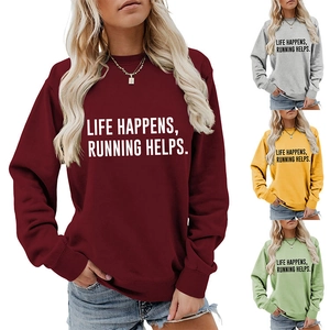 Detail of soft cotton crewneck sweatshirt with 'Life Happens Running Helps' text in four colors