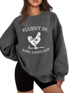 Detail of grey oversized sweatshirt with white rooster print and funny slogan