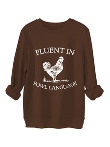 Detail of coffee brown crewneck sweatshirt featuring white rooster print and ribbed cuffs