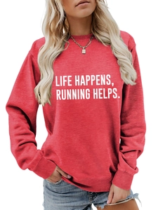 Detail of red crewneck sweatshirt with Life Happens Running Helps white slogan print