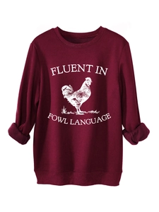 Macro detail of wine red sweatshirt featuring thick fleece lining and ribbed cuffs