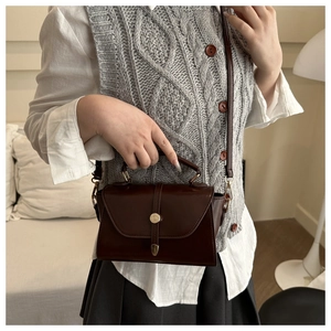 Retro chocolate brown small square bag with golden buckle styled with vintage outfit