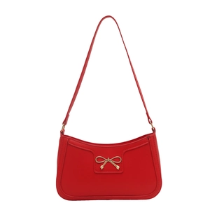 Chic red crescent underarm bag with gold bow detail and smooth faux leather finish
