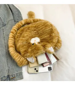 Detail view of the plush cat crossbody bag showing its large interior storage space
