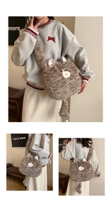 Detail view of plush cat crossbody bag with soft faux fur texture and 3D ear accents