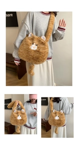 Detail view of the plush orange cat shoulder bag with soft fur and cat ear design