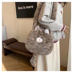Close-up of cute cat-shaped plush shoulder bag featuring realistic 3D ears and long tail