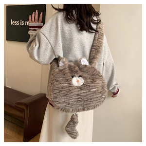 Detail of the cat-shaped plush shoulder bag with brown stripes and a long fluffy tail