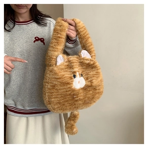 Detailed plush ginger cat shoulder bag with soft fur texture and cute 3D ears design