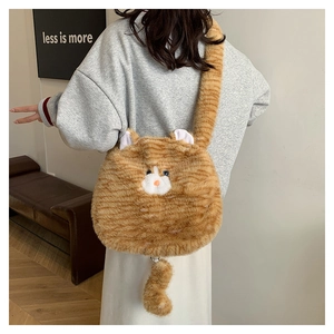 Close-up of fluffy orange tabby cat plush shoulder bag with 3D ears and soft furry tail