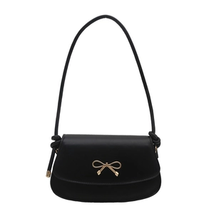 Sac sous le bras minimaliste en cuir noir avec nœud doré et bandoulière à nœuds