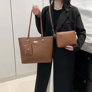 Three-piece brown leather tote bag set including handbag and card holder for women