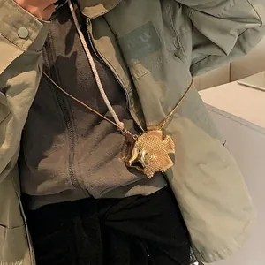Mini golden fish-shaped metal crossbody bag with fine scales and long chain strap