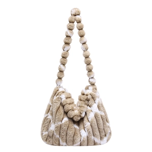 Chic khaki striped faux fur shoulder bag with plush ball handle for women in 2025