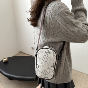 Fashionable white crossbody square bag with black letter print and adjustable brown strap
