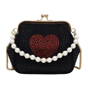 Elegant black rhinestone evening clutch with red heart design and pearl handle strap