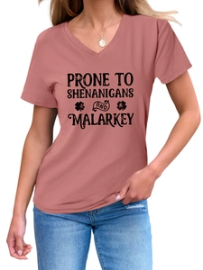 Detail of V-neck mauve t-shirt with Prone to Shenanigans print and shamrock art