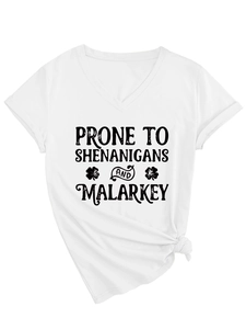 Detail of white V-neck T-shirt featuring Prone to Shenanigans print and front knot detail