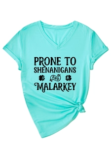 Detail of mint green V-neck T-shirt with black Prone to Shenanigans printed text