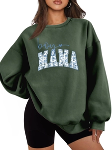 Detail of forest green sweatshirt featuring blue floral boy MAMA print and crew neck