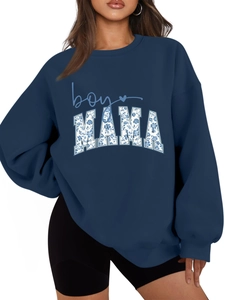 Detail of dark blue sweatshirt with floral BOY MAMA print and ribbed cuffs