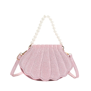 Pink shell-shaped crossbody bag with glitter finish and elegant pearl top handle strap
