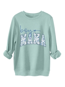 Detail of floral pattern MAMA and boy text print on mint green cotton sweatshirt