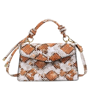 Chic snakeskin print handbag with knotted handles and detachable shoulder strap
