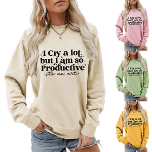 Detail of loose round neck sweatshirt with 'I Cry a lot' graphic print in multiple colors