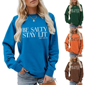 Close-up of ribbed cuffs and vibrant colored fabrics for oversized slogan sweatshirts