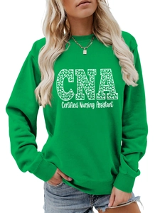 Close-up of bright green CNA sweatshirt with white leopard print lettering and ribbed collar