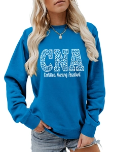 Close-up of blue CNA Certified Nursing Assistant sweatshirt with white leopard print text