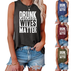 Detail view of Drunk Wives Matter tank tops showing black, blue, red and green options