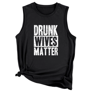 Detail of loose black tank top with Drunk Wives Matter slogan and knot hem design