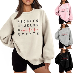 Detail of crewneck sweatshirts showing four colors with heart rhythm and letter prints