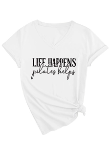 Detail of V-neck white Pilates T-shirt with 'Life Happens' print and stylish knotted hem