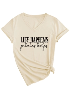 Detail of V-neck beige t-shirt featuring Life Happens Pilates Helps printed text and side knot