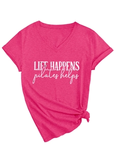Detail of V-neck magenta t-shirt with Life Happens Pilates Helps print and side knot