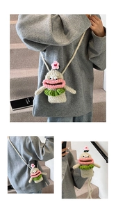 Handmade crochet monster phone bag featuring pink lips and green ruffled trim