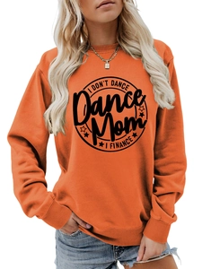 Detail of orange crewneck sweatshirt featuring I DON'T DANCE text print and ribbed cuffs