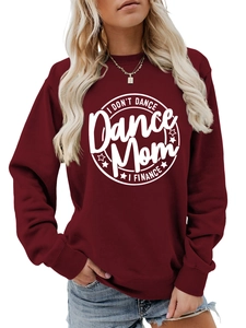 Close-up of I DON'T DANCE print on burgundy crewneck sweatshirt with cotton texture