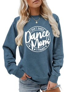 Close-up of ribbed cuffs and white circular text print on blue-grey sweatshirt