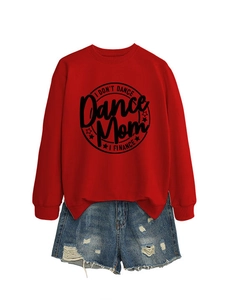 Detail of red crewneck sweatshirt with 'Dance Mom' print and distressed denim shorts